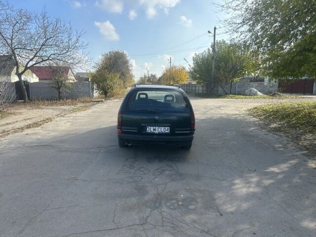 Зелений Опель Омега, об'ємом двигуна 2 л та пробігом 295 тис. км за 1300 $, фото 4 на Automoto.ua
