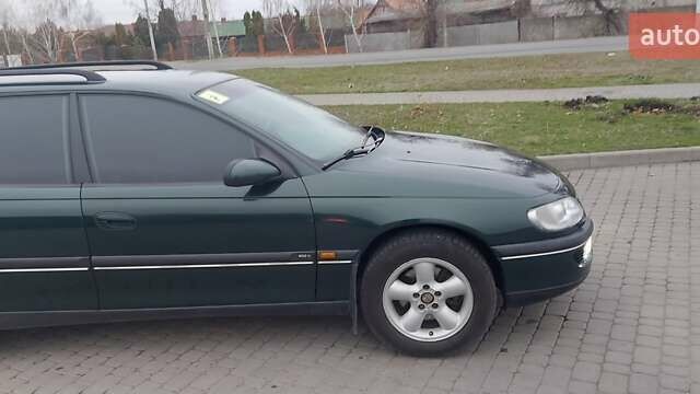 Зелений Опель Омега, об'ємом двигуна 2 л та пробігом 182 тис. км за 3850 $, фото 16 на Automoto.ua