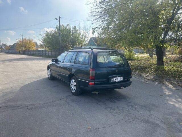 Зелений Опель Омега, об'ємом двигуна 2 л та пробігом 295 тис. км за 1300 $, фото 3 на Automoto.ua