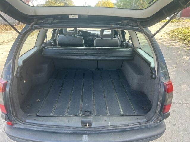 Зелений Опель Омега, об'ємом двигуна 2 л та пробігом 295 тис. км за 1300 $, фото 10 на Automoto.ua