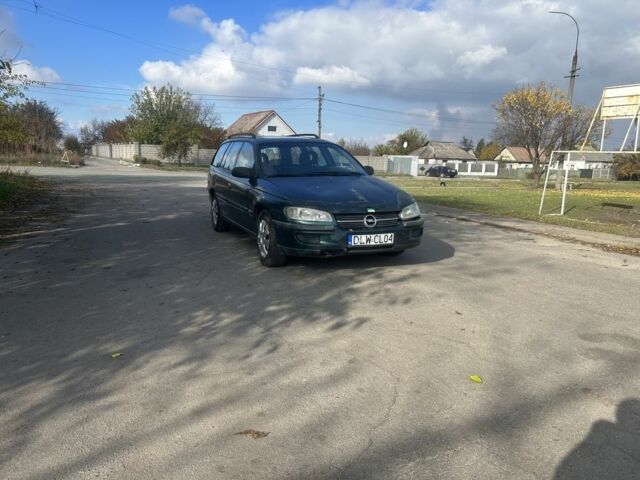 Зелений Опель Омега, об'ємом двигуна 2 л та пробігом 295 тис. км за 1300 $, фото 6 на Automoto.ua