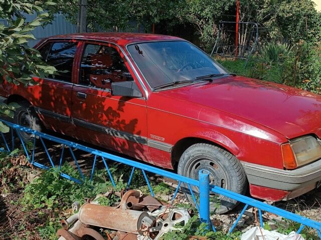 Красный Опель Рекорд, объемом двигателя 2.2 л и пробегом 200 тыс. км за 603 $, фото 1 на Automoto.ua