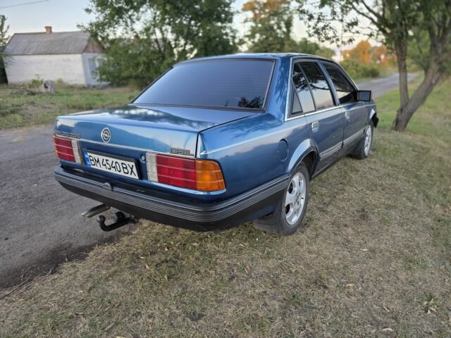 Синий Опель Рекорд, объемом двигателя 2 л и пробегом 600 тыс. км за 1300 $, фото 1 на Automoto.ua