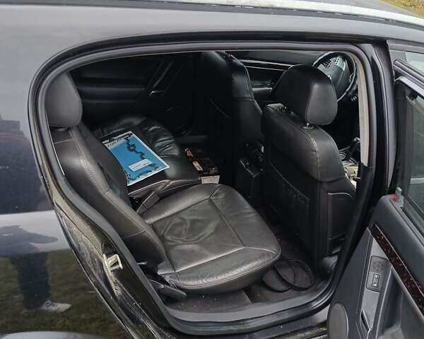 Черный Опель Сигнум, объемом двигателя 2.2 л и пробегом 370 тыс. км за 2000 $, фото 6 на Automoto.ua