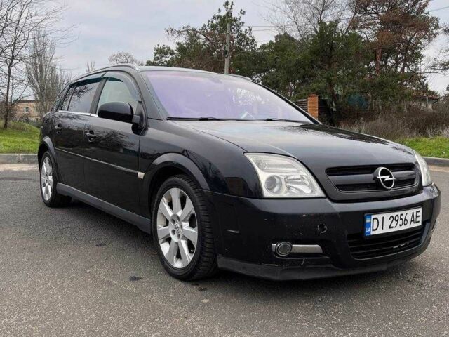 Черный Опель Сигнум, объемом двигателя 2.2 л и пробегом 297 тыс. км за 4600 $, фото 1 на Automoto.ua
