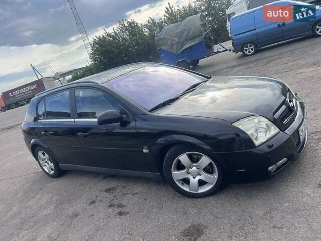 Черный Опель Сигнум, объемом двигателя 3 л и пробегом 230 тыс. км за 4500 $, фото 7 на Automoto.ua