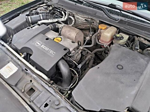 Черный Опель Сигнум, объемом двигателя 2 л и пробегом 360 тыс. км за 2600 $, фото 1 на Automoto.ua