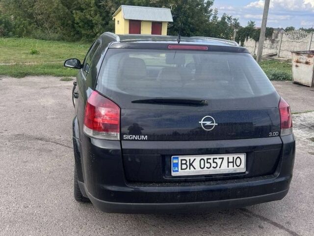 Черный Опель Сигнум, объемом двигателя 3 л и пробегом 230 тыс. км за 4500 $, фото 4 на Automoto.ua