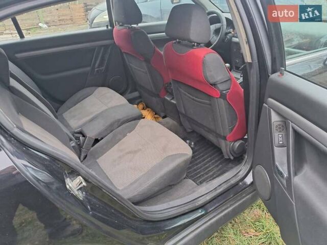 Черный Опель Сигнум, объемом двигателя 2 л и пробегом 360 тыс. км за 2600 $, фото 4 на Automoto.ua