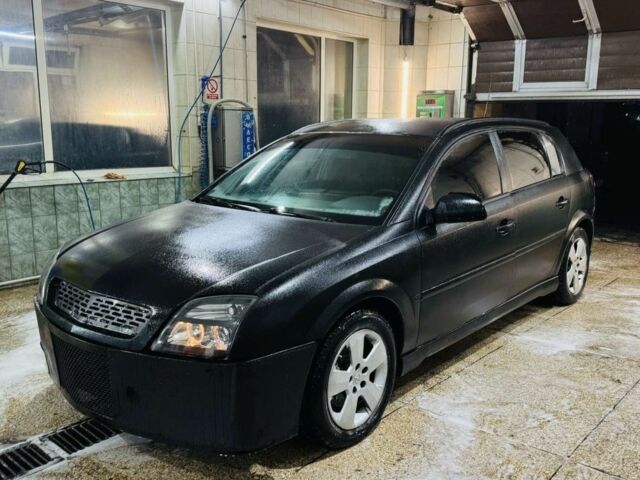 Черный Опель Сигнум, объемом двигателя 2 л и пробегом 290 тыс. км за 2000 $, фото 1 на Automoto.ua