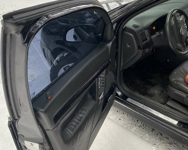 Черный Опель Сигнум, объемом двигателя 1.9 л и пробегом 280 тыс. км за 5500 $, фото 11 на Automoto.ua