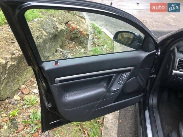 Черный Опель Сигнум, объемом двигателя 1.9 л и пробегом 283 тыс. км за 4500 $, фото 10 на Automoto.ua