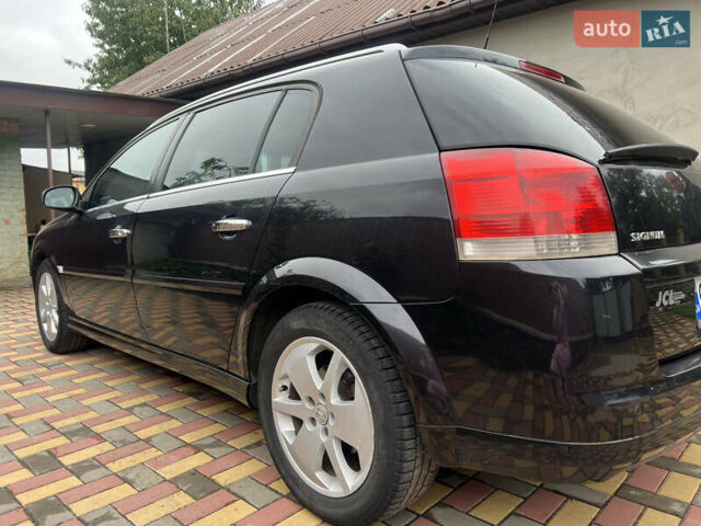 Черный Опель Сигнум, объемом двигателя 1.91 л и пробегом 181 тыс. км за 5700 $, фото 8 на Automoto.ua