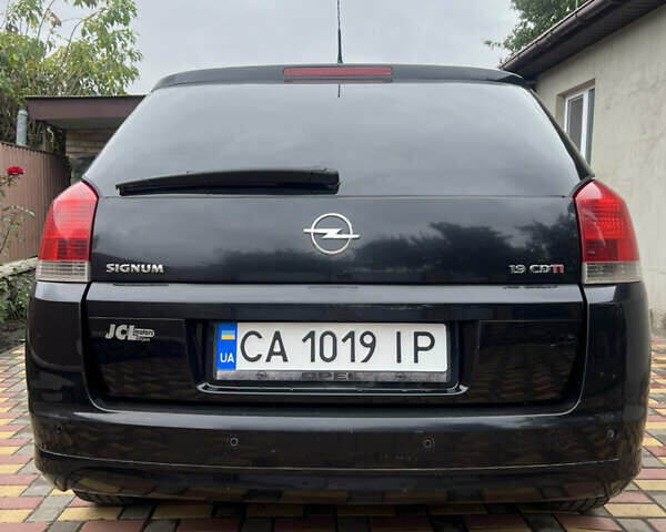 Черный Опель Сигнум, объемом двигателя 1.91 л и пробегом 181 тыс. км за 5700 $, фото 1 на Automoto.ua