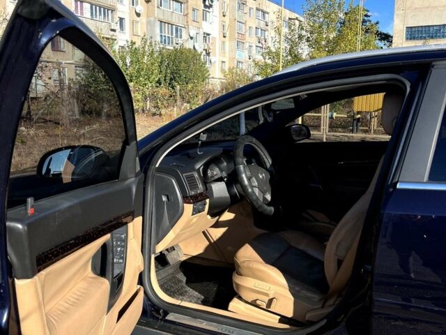 Синий Опель Сигнум, объемом двигателя 2.2 л и пробегом 205 тыс. км за 4600 $, фото 2 на Automoto.ua