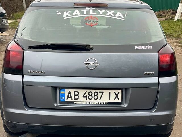 Синий Опель Сигнум, объемом двигателя 1.9 л и пробегом 300 тыс. км за 3450 $, фото 5 на Automoto.ua