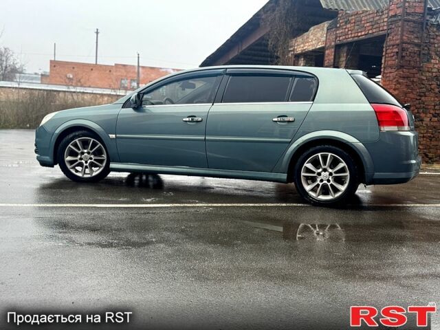 Синий Опель Сигнум, объемом двигателя 1.9 л и пробегом 253 тыс. км за 4350 $, фото 5 на Automoto.ua