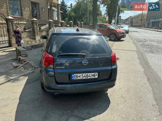 Синий Опель Сигнум, объемом двигателя 1.91 л и пробегом 202 тыс. км за 5400 $, фото 2 на Automoto.ua