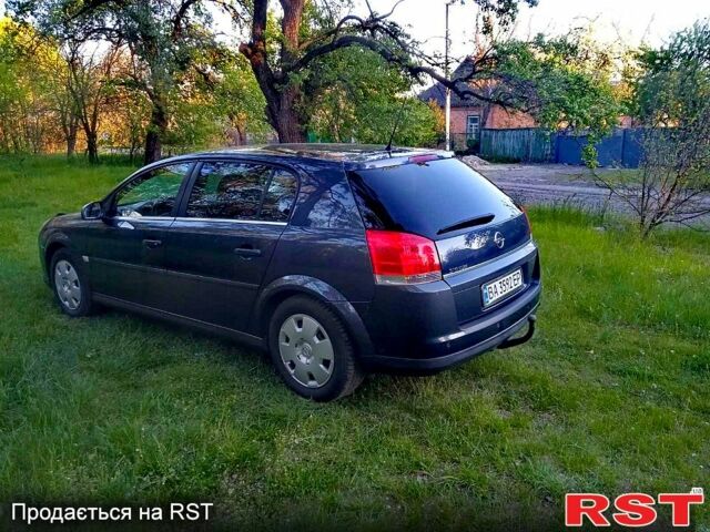 Синий Опель Сигнум, объемом двигателя 2.2 л и пробегом 202 тыс. км за 5400 $, фото 1 на Automoto.ua