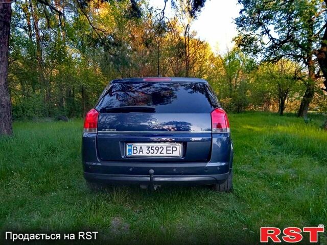 Синий Опель Сигнум, объемом двигателя 2.2 л и пробегом 202 тыс. км за 5400 $, фото 3 на Automoto.ua