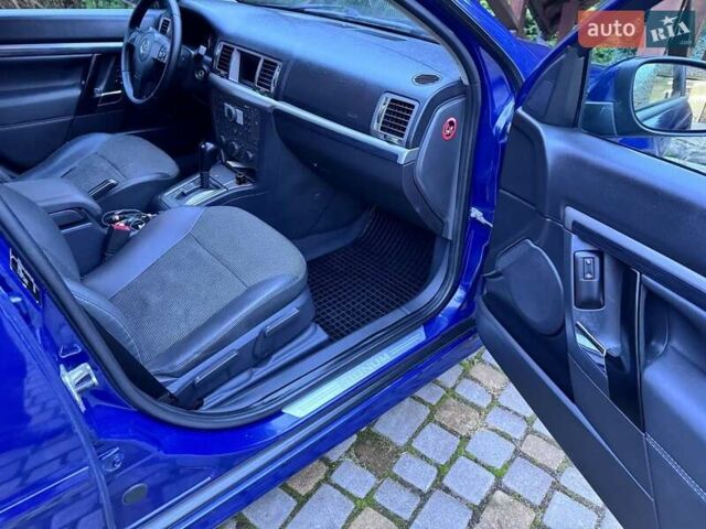 Синий Опель Сигнум, объемом двигателя 2.96 л и пробегом 246 тыс. км за 5500 $, фото 24 на Automoto.ua