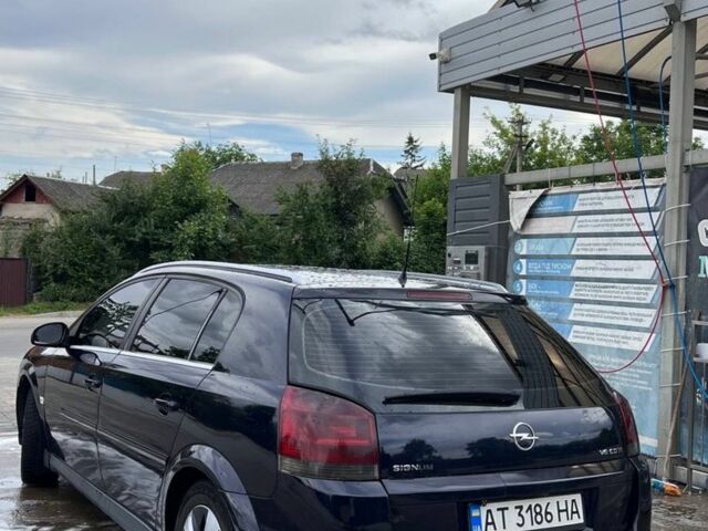 Синий Опель Сигнум, объемом двигателя 3 л и пробегом 350 тыс. км за 3610 $, фото 2 на Automoto.ua
