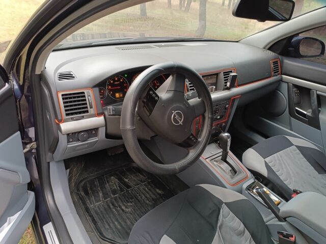 Синий Опель Сигнум, объемом двигателя 2.2 л и пробегом 260 тыс. км за 4200 $, фото 6 на Automoto.ua