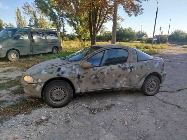 Бежевий Опель Тігра, об'ємом двигуна 0 л та пробігом 195 тис. км за 1419 $, фото 1 на Automoto.ua