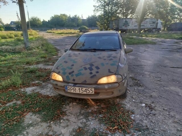 Бежевий Опель Тігра, об'ємом двигуна 0 л та пробігом 195 тис. км за 1419 $, фото 3 на Automoto.ua