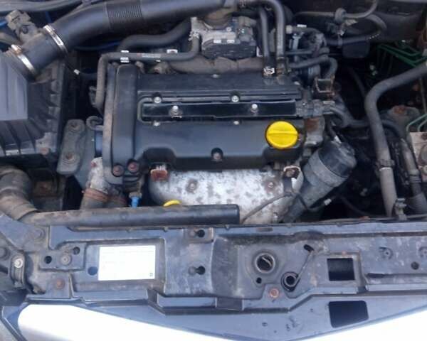 Черный Опель Тигра, объемом двигателя 1.4 л и пробегом 164 тыс. км за 5000 $, фото 5 на Automoto.ua