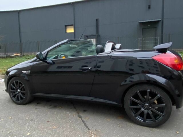 Черный Опель Тигра, объемом двигателя 1.8 л и пробегом 167 тыс. км за 5000 $, фото 7 на Automoto.ua