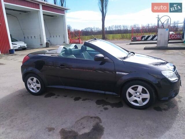 Черный Опель Тигра, объемом двигателя 1.8 л и пробегом 200 тыс. км за 5200 $, фото 9 на Automoto.ua