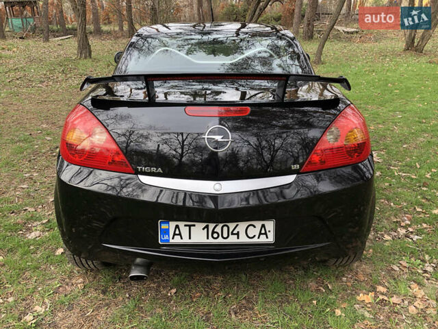 Чорний Опель Тігра, об'ємом двигуна 1.8 л та пробігом 160 тис. км за 5000 $, фото 3 на Automoto.ua