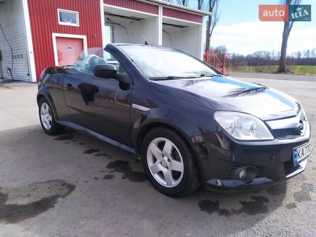 Черный Опель Тигра, объемом двигателя 1.8 л и пробегом 200 тыс. км за 5200 $, фото 11 на Automoto.ua