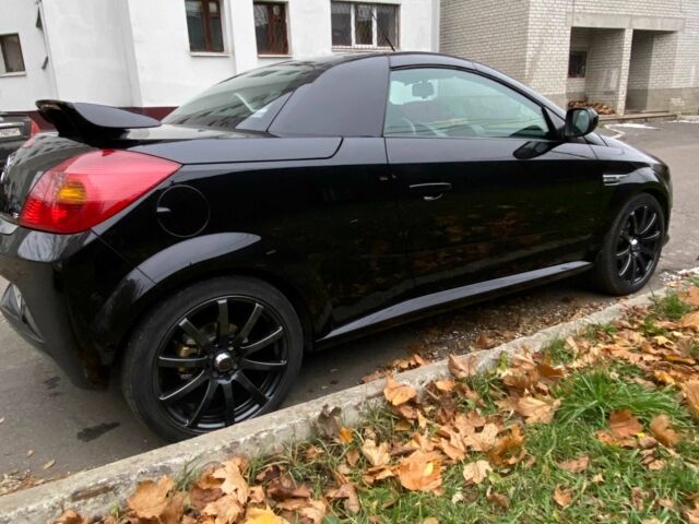 Черный Опель Тигра, объемом двигателя 1.8 л и пробегом 167 тыс. км за 5000 $, фото 5 на Automoto.ua