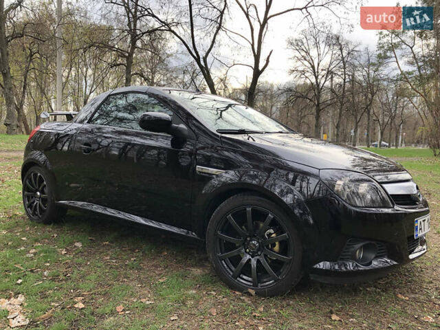 Чорний Опель Тігра, об'ємом двигуна 1.8 л та пробігом 160 тис. км за 5000 $, фото 2 на Automoto.ua