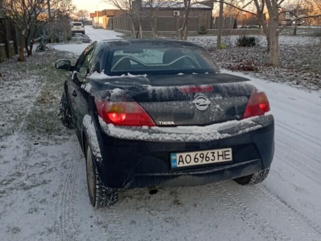 Черный Опель Тигра, объемом двигателя 1.4 л и пробегом 260 тыс. км за 3000 $, фото 3 на Automoto.ua