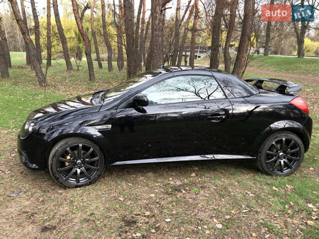 Чорний Опель Тігра, об'ємом двигуна 1.8 л та пробігом 160 тис. км за 5000 $, фото 4 на Automoto.ua