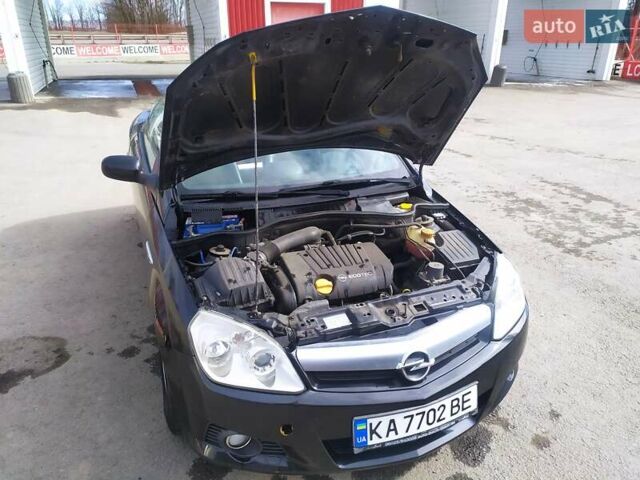 Черный Опель Тигра, объемом двигателя 1.8 л и пробегом 200 тыс. км за 5200 $, фото 10 на Automoto.ua