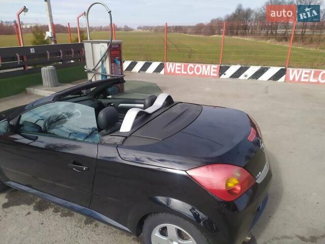 Черный Опель Тигра, объемом двигателя 1.8 л и пробегом 200 тыс. км за 5200 $, фото 8 на Automoto.ua