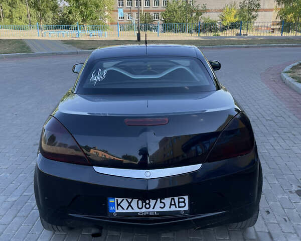 Чорний Опель Тігра, об'ємом двигуна 1.25 л та пробігом 180 тис. км за 3900 $, фото 15 на Automoto.ua