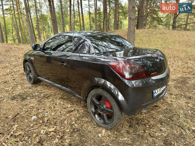 Черный Опель Тигра, объемом двигателя 1.25 л и пробегом 185 тыс. км за 3999 $, фото 3 на Automoto.ua