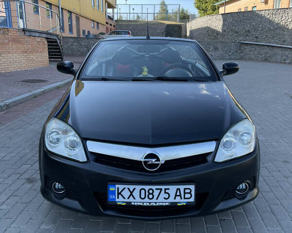 Чорний Опель Тігра, об'ємом двигуна 1.25 л та пробігом 180 тис. км за 3900 $, фото 1 на Automoto.ua