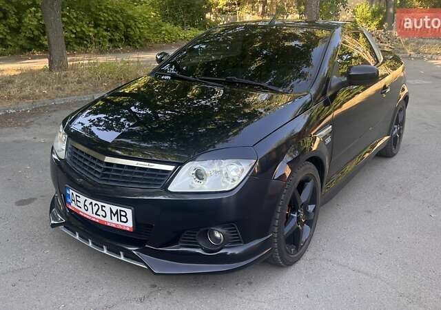 Черный Опель Тигра, объемом двигателя 1.36 л и пробегом 143 тыс. км за 5200 $, фото 13 на Automoto.ua