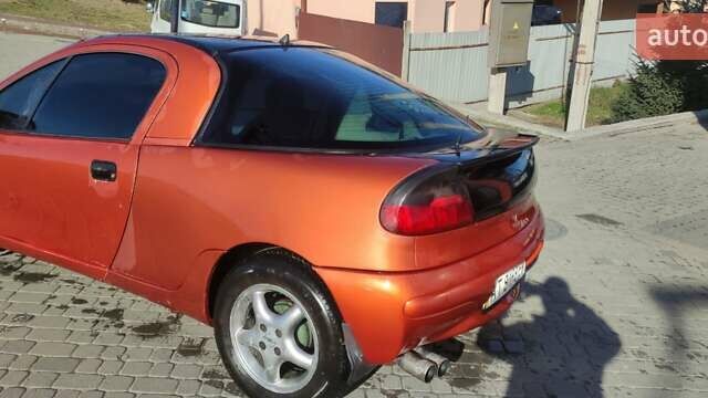 Коричневый Опель Тигра, объемом двигателя 1.39 л и пробегом 194 тыс. км за 1500 $, фото 4 на Automoto.ua