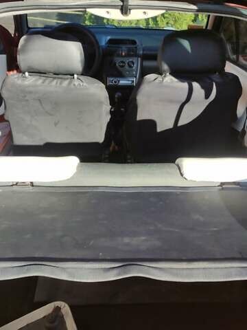 Коричневый Опель Тигра, объемом двигателя 1.39 л и пробегом 194 тыс. км за 1500 $, фото 14 на Automoto.ua