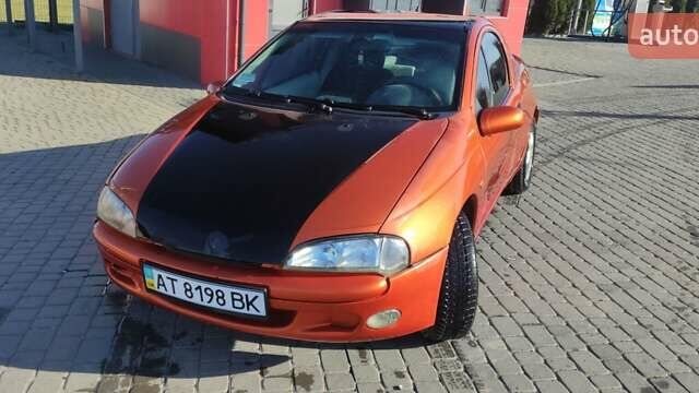 Коричневый Опель Тигра, объемом двигателя 1.39 л и пробегом 194 тыс. км за 1500 $, фото 7 на Automoto.ua