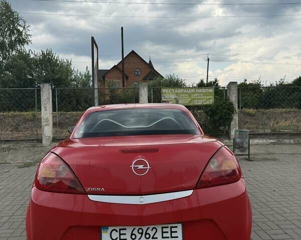 Красный Опель Тигра, объемом двигателя 0 л и пробегом 195 тыс. км за 5000 $, фото 5 на Automoto.ua