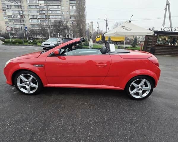 Красный Опель Тигра, объемом двигателя 1.4 л и пробегом 238 тыс. км за 6200 $, фото 9 на Automoto.ua