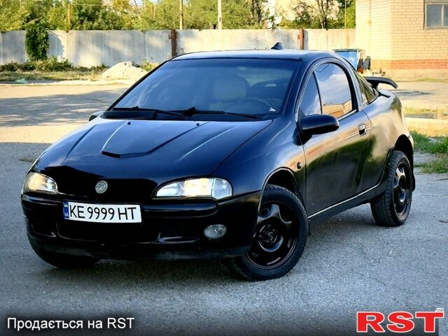 Опель Тигра, объемом двигателя 1.4 л и пробегом 222 тыс. км за 1650 $, фото 8 на Automoto.ua